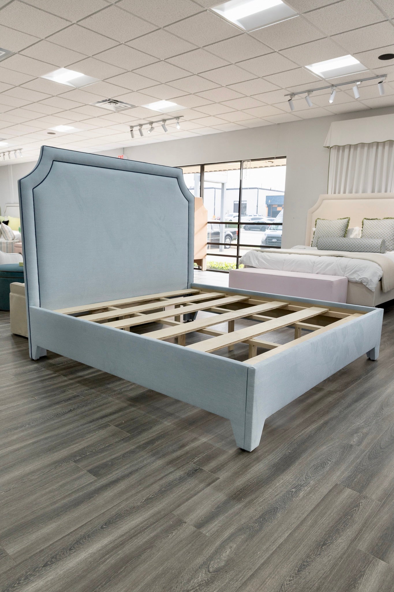 The Addison King Bed - Upholstered Legs - Sky Blue Woven Fabric with Navy Trim