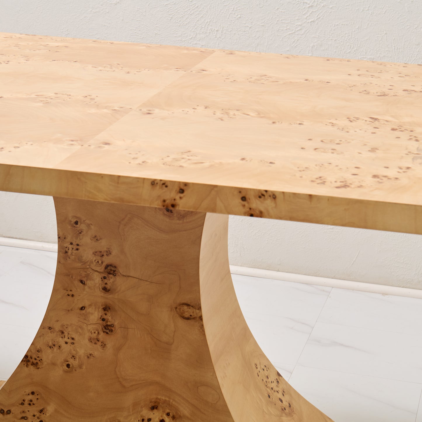 The Luca Burl Dining Table β Amber Finish