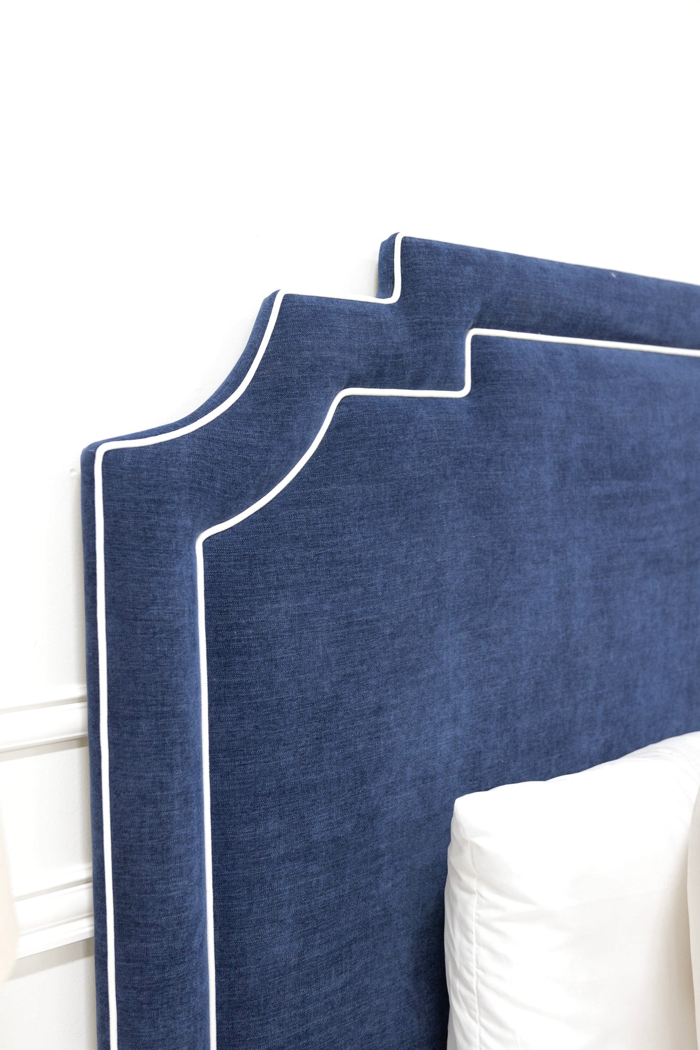 The Martha King Platform Bed - Upholstered Legs - Crypton Fabric in Navy Blue - White Trim