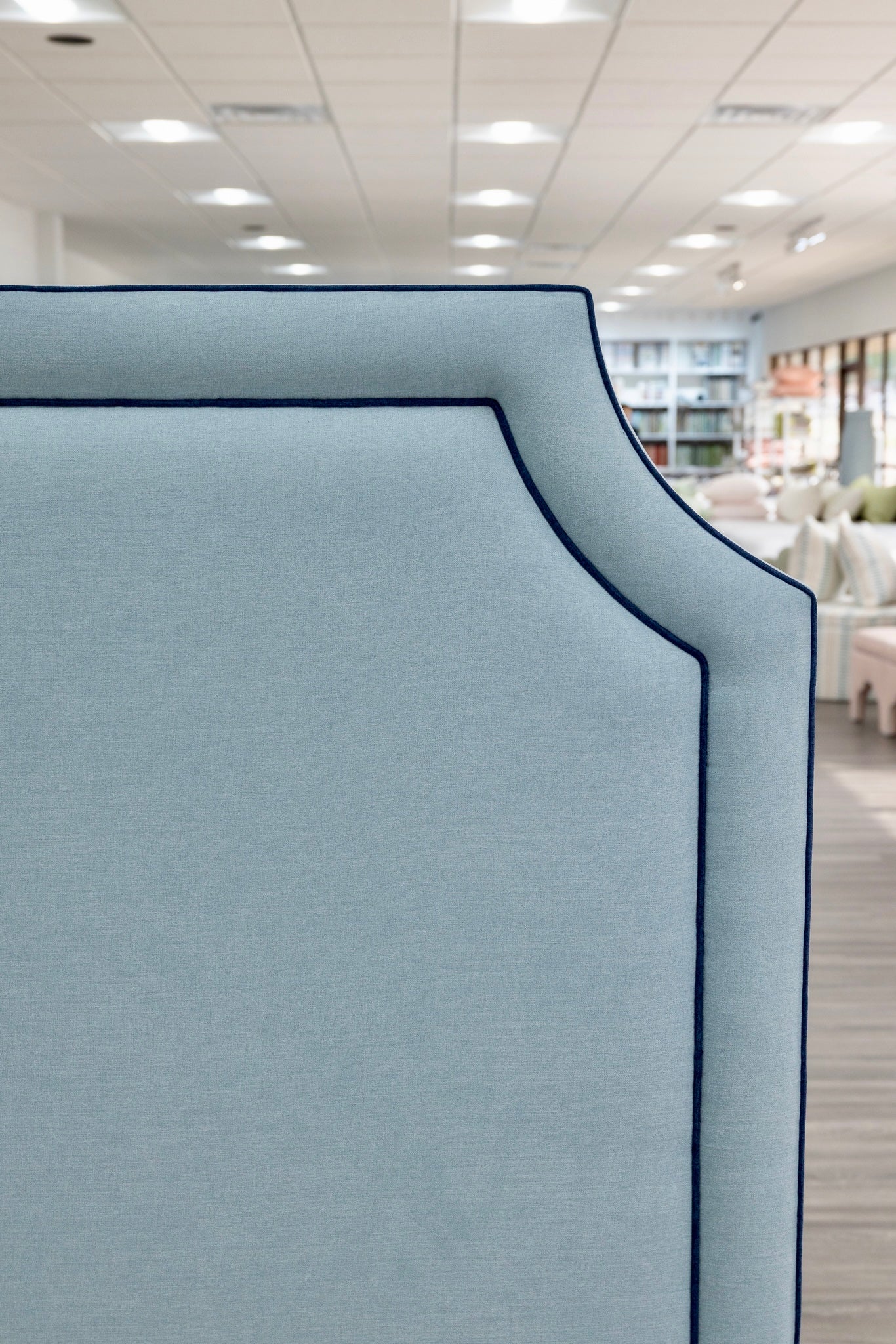 The Addison King Bed - Upholstered Legs - Sky Blue Woven Fabric with Navy Trim