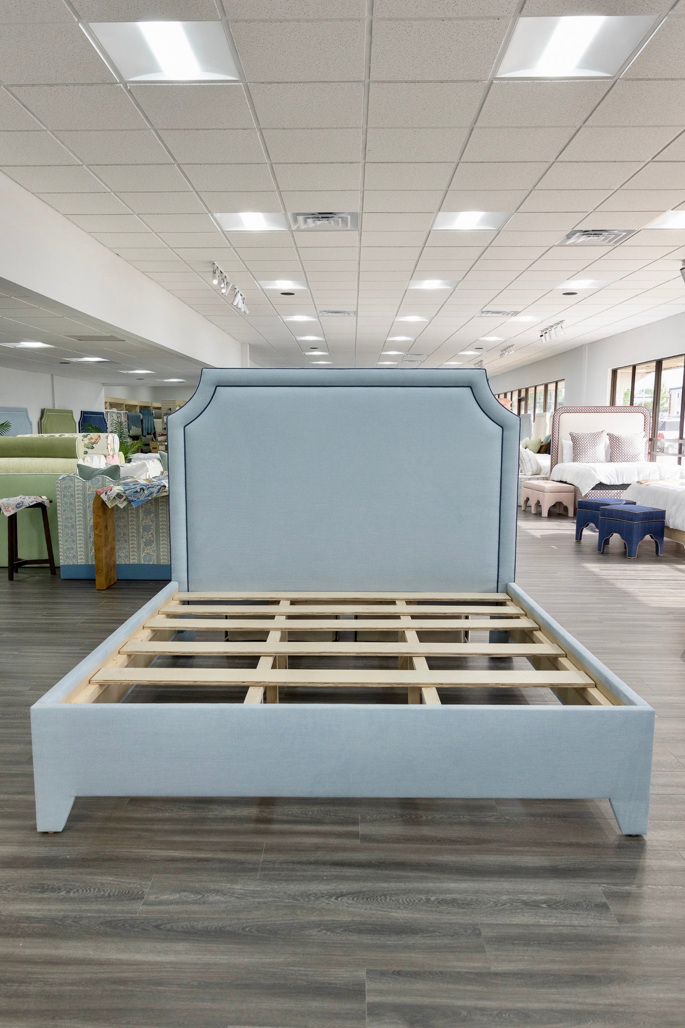 The Addison King Bed - Upholstered Legs - Sky Blue Woven Fabric with Navy Trim