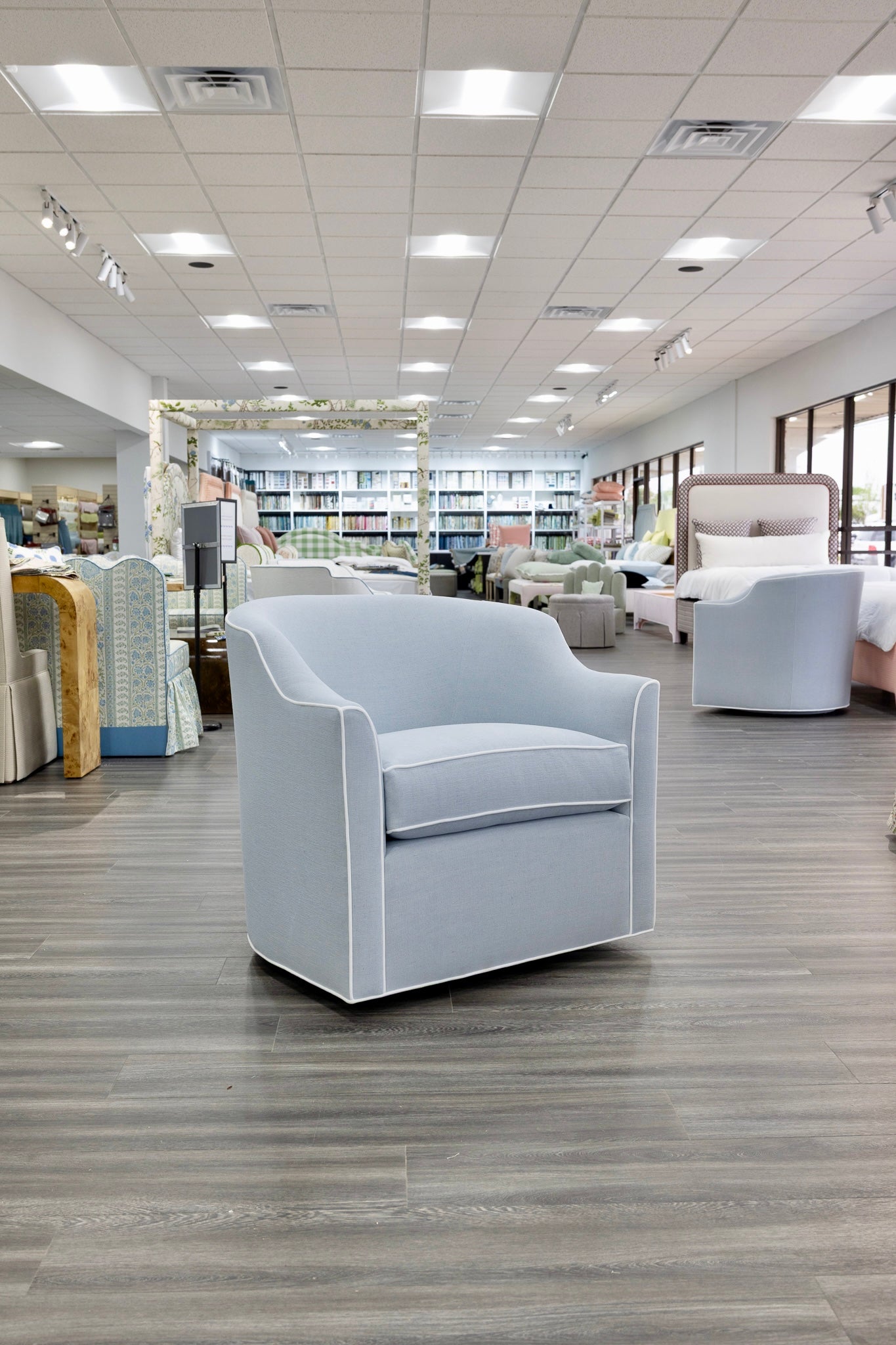Custom Swivel Chair: Performance Light Blue Crypton Fabric - White Trim