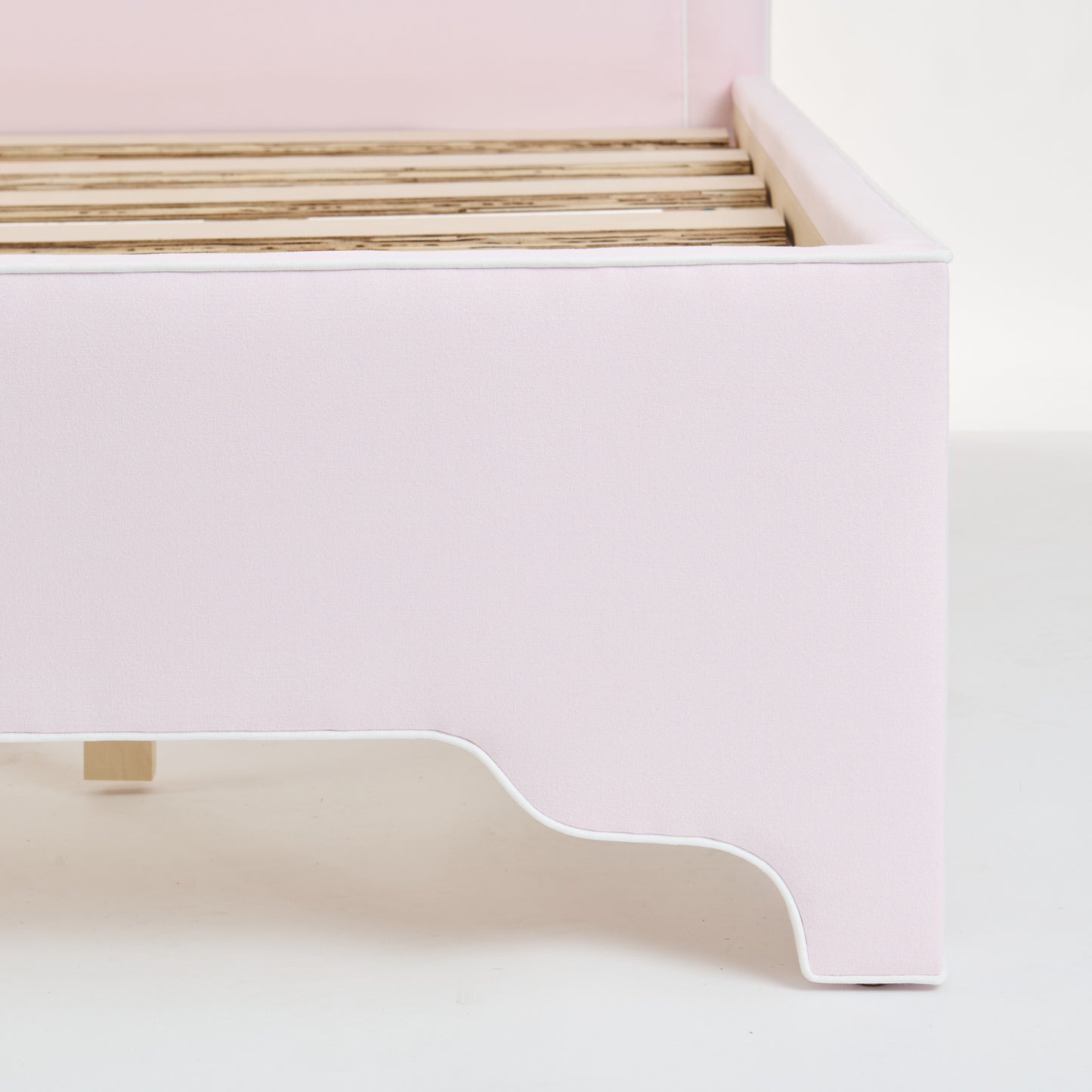 65” H Queen Upholstered Platform Bed - Scalloped Legs - Powder Pink Woven Fabric with White Trim