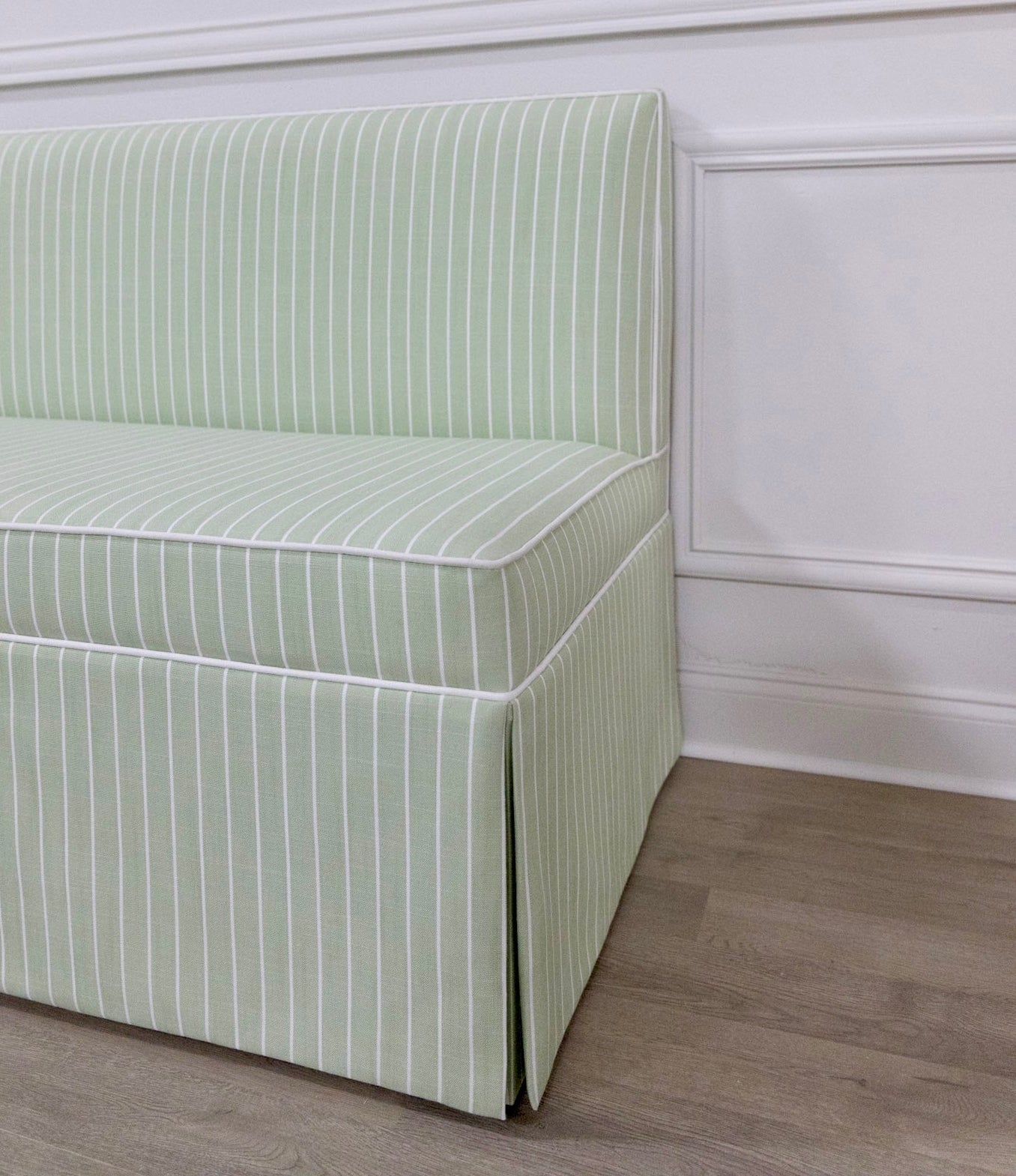  Custom Upholstered Skirted Banquette – Green Striped Fabric, White Piping