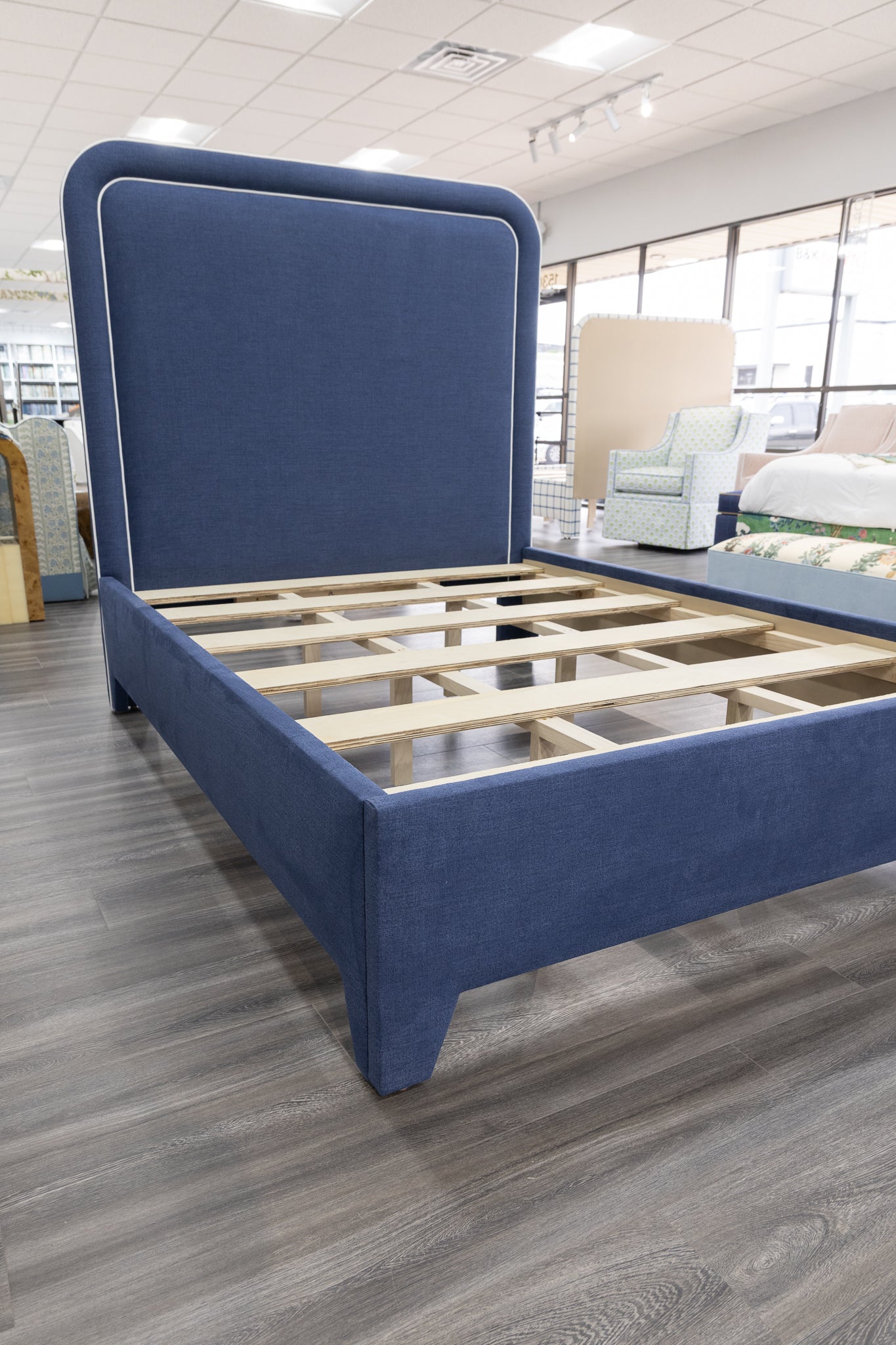 The Lorraine Queen Platform Bed in Navy Woven Fabric - White Trim
