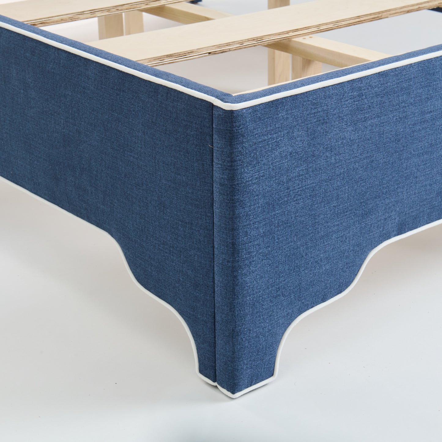 65"H King Upholstered Platform Bed - Scalloped Legs - Navy Woven Fabric with White Trim