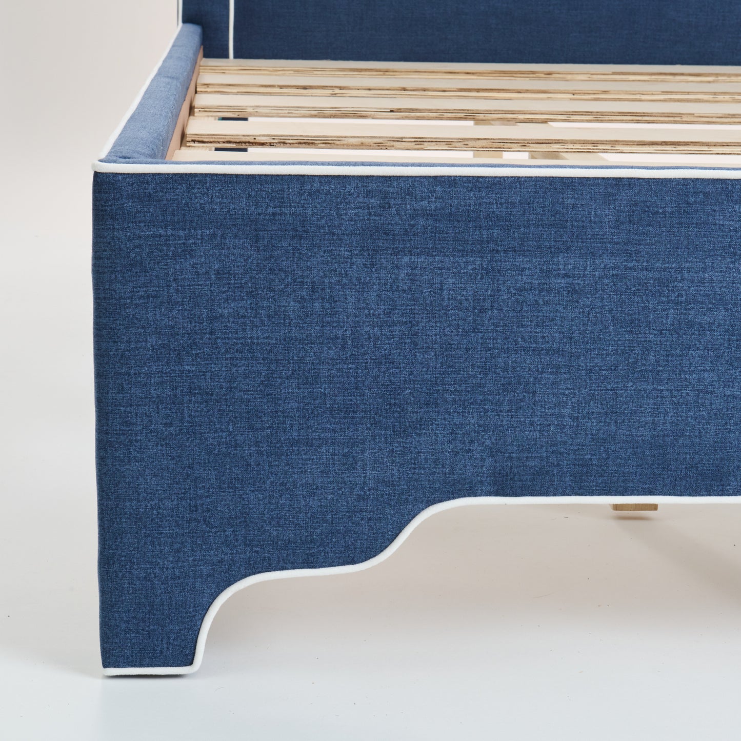 65"H King Upholstered Platform Bed - Scalloped Legs - Navy Woven Fabric with White Trim