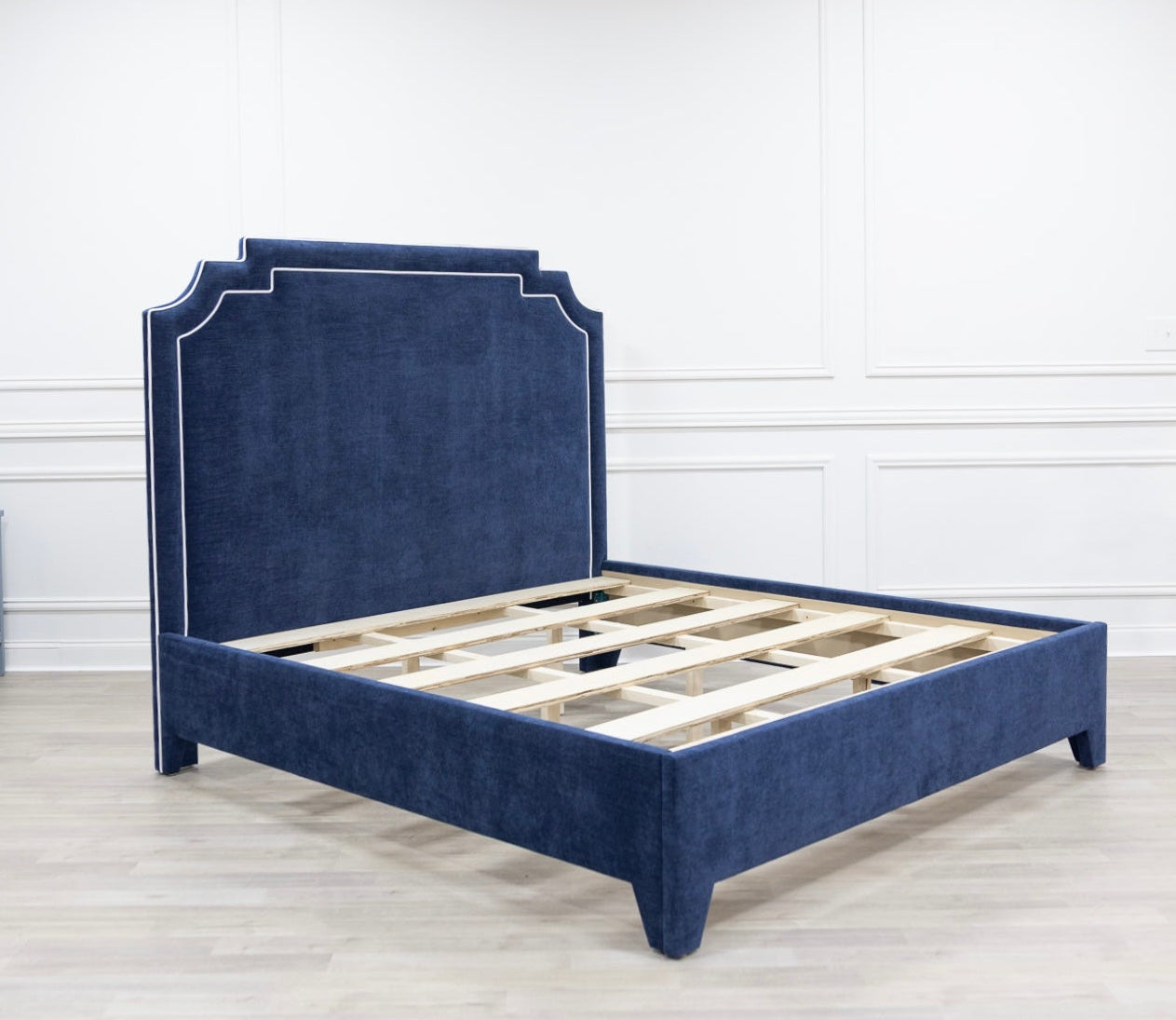 The Martha King Platform Bed - Upholstered Legs - Crypton Fabric in Navy Blue - White Trim