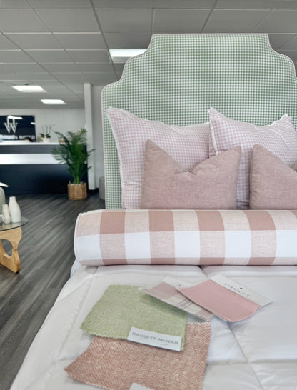 Twin scalloped platform bed.