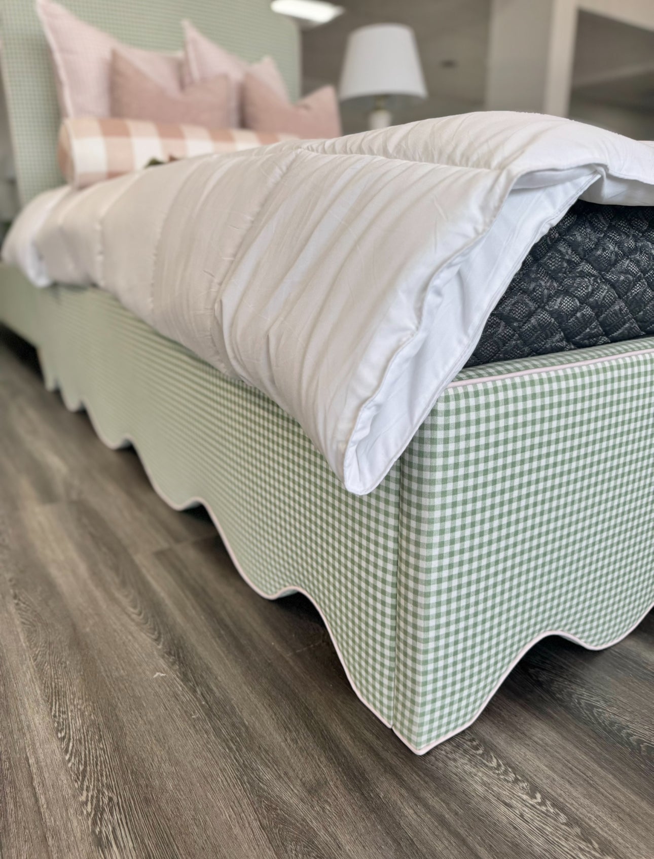 Twin scalloped platform bed.